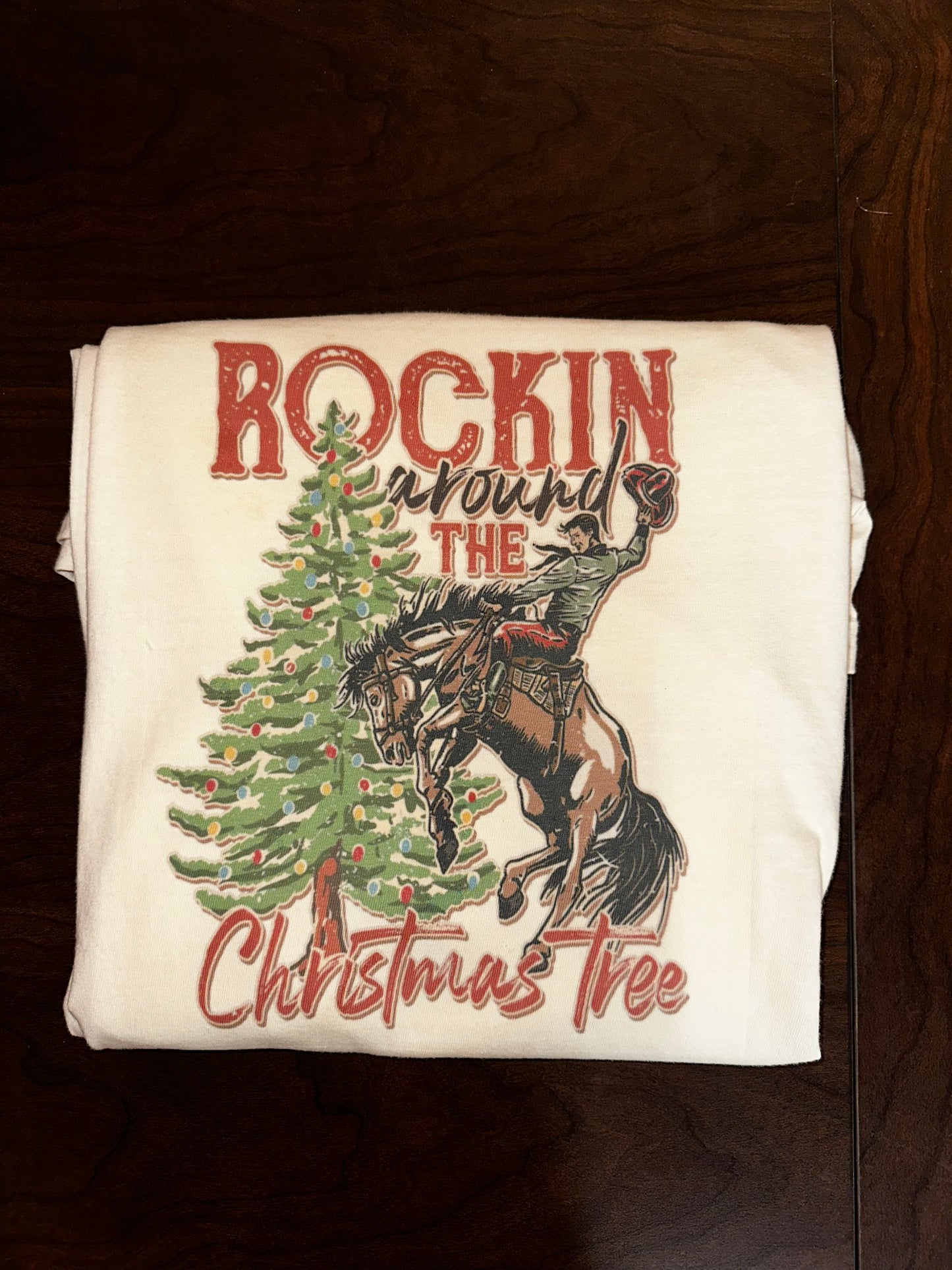 ROCKIN AROUND TGE CHRISTMAS TREE
